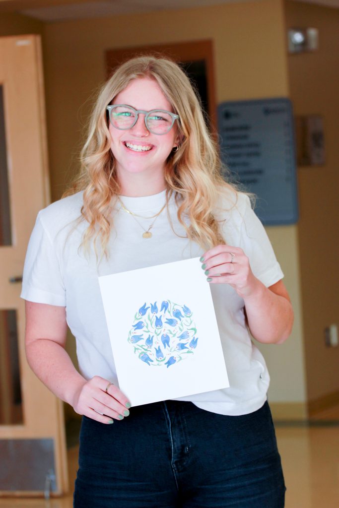 Third-year student, Kirsten Hildebrand, created art to sell as a fundraiser for MX3.